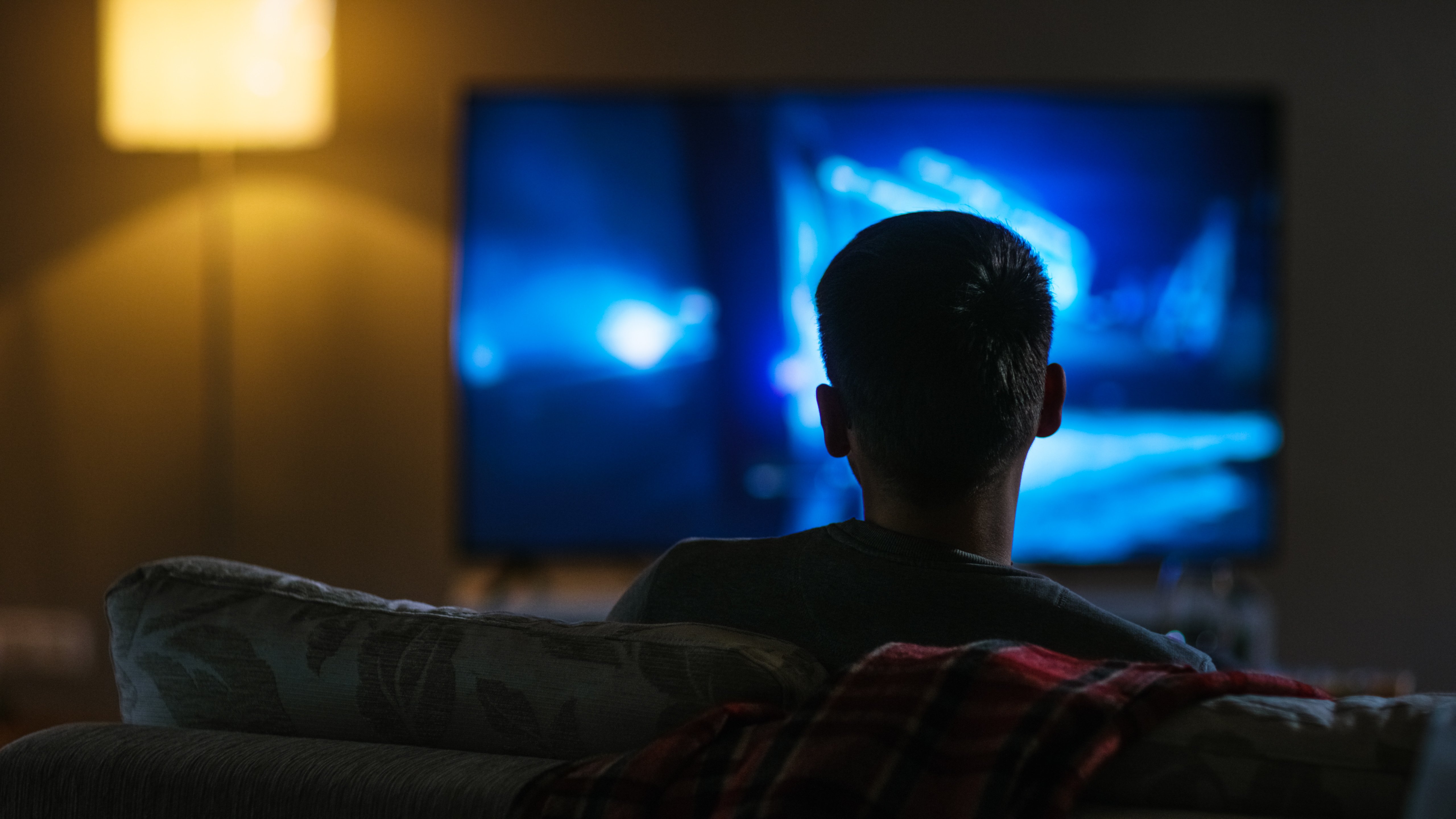 male watching tv